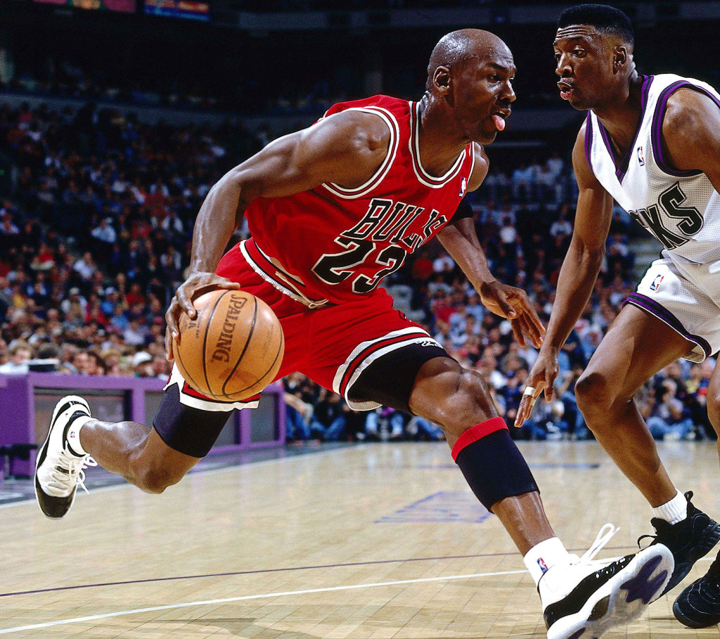 MILWAUKEE - APRIL 16:  Michael Jordan #23 of the Chicago Bulls drives baseline against the Milwaukee Bucks during the NBA game at the Bradley Center on April 16, 1996 in Milwaukee, Wisconsin.  NOTE TO USER: User expressly acknowledges and agrees that, by downloading and/or using this Photograph, User is consenting to the terms and conditions of the Getty Images License Agreement.  Mandatory Copyright Notice:  Copyright 1996 NBAE  (Photo by Nathaniel S. Butler/NBAE via Getty Images)