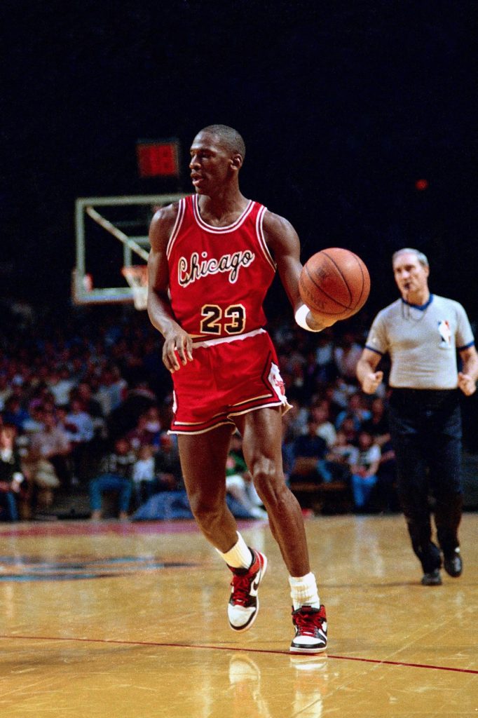MILWAUKEE - 1985: Michael Jordan #23 of the Chicago Bulls dribbles against the Milwaukee Bucks circa 1985 at the Bradley Center in Milwaukee, Wisconsin. NOTE TO USER: User expressly acknowledges and agrees that, by downloading and/or using this photograph, user is consenting to the terms and conditions of the Getty Images License Agreement. Mandatory Copyright Notice: Copyright 1985 NBAE (Photo by Robert Lewis/NBAE via Getty Images)